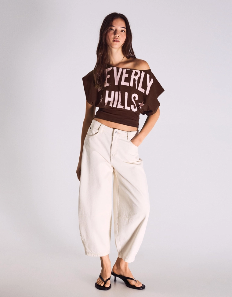 Футболка асимметричного кроя с короткими рукавами и принтом