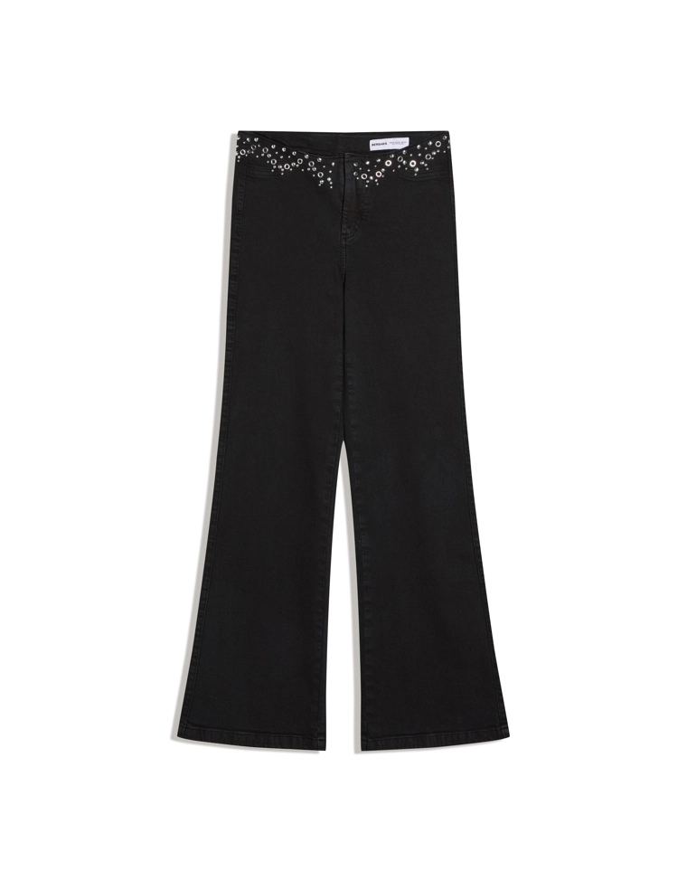 Брюки с заклепками на поясе