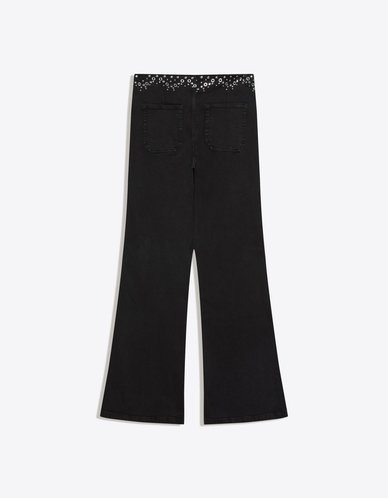 Брюки с заклепками на поясе