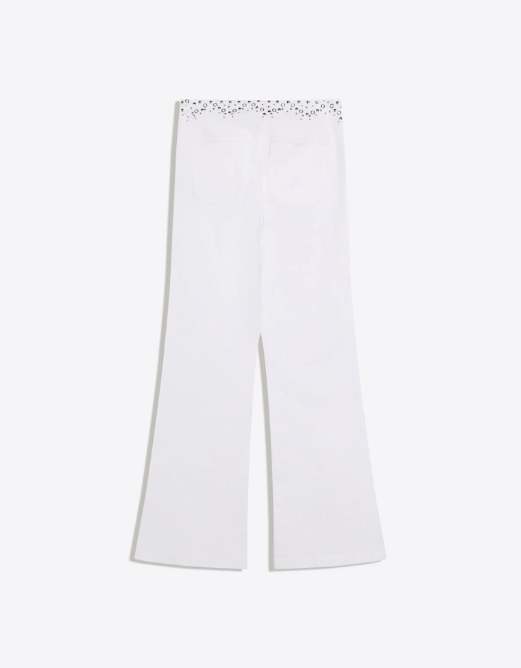 Брюки с заклепками на поясе