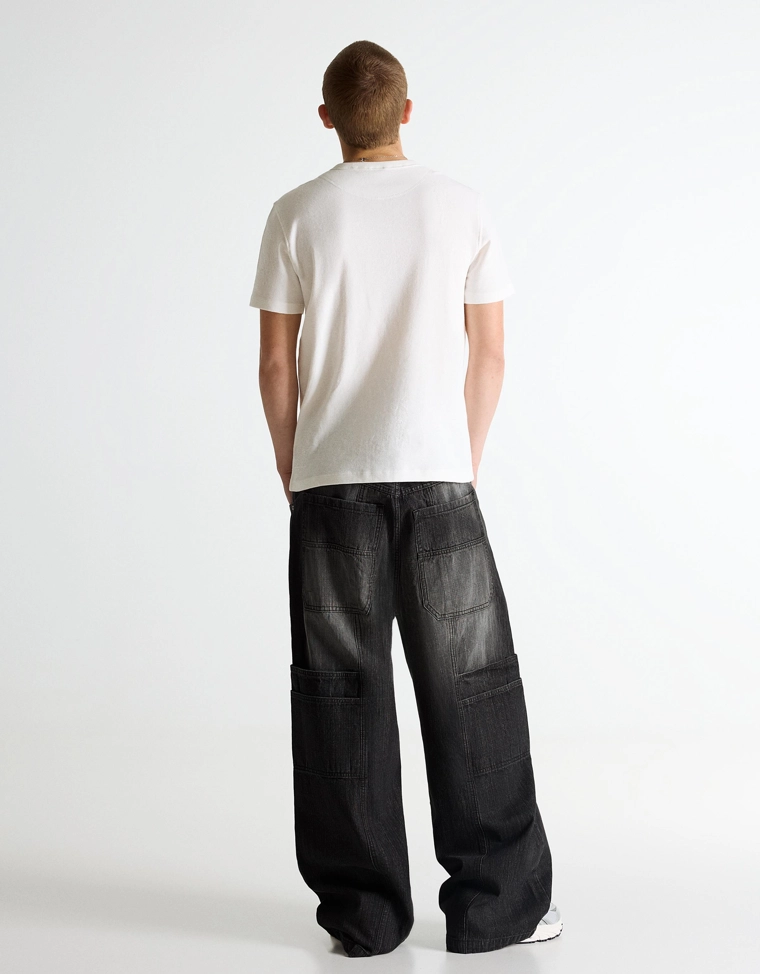 Объемные джинсы свободного кроя