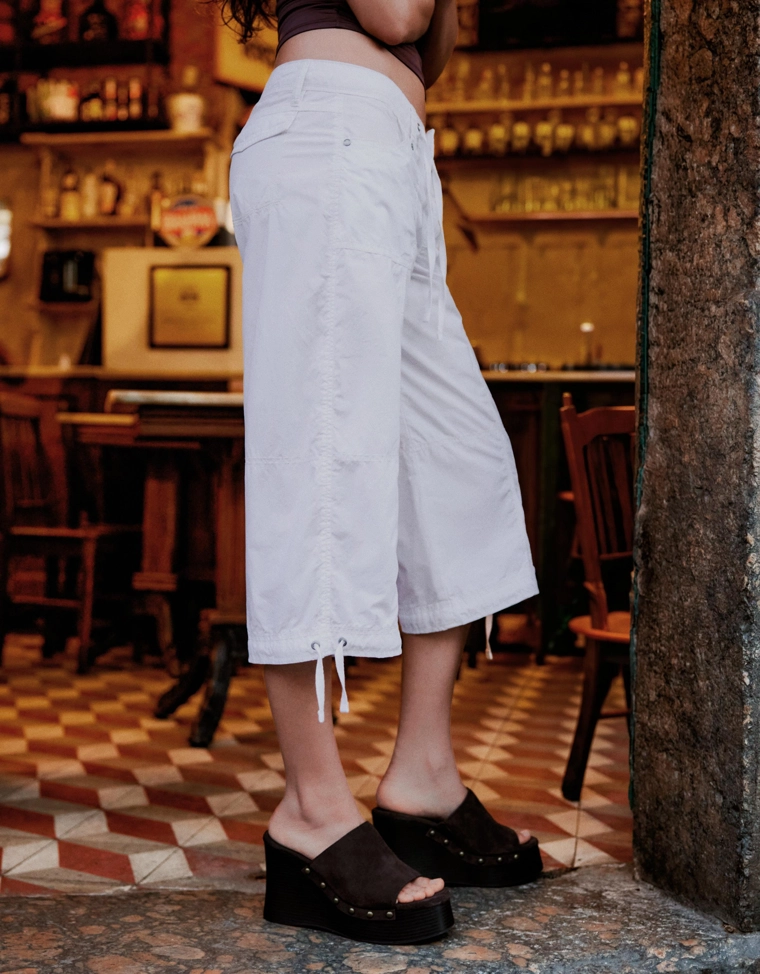 Брюки капри с карманами