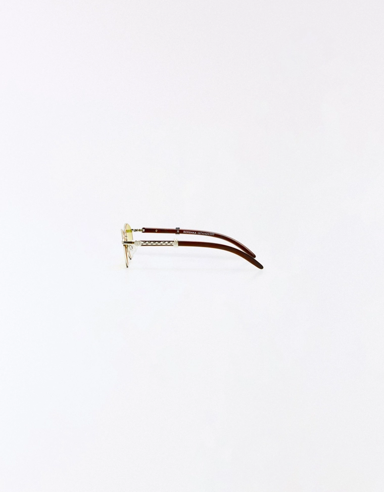 Солнечные очки овальной формы