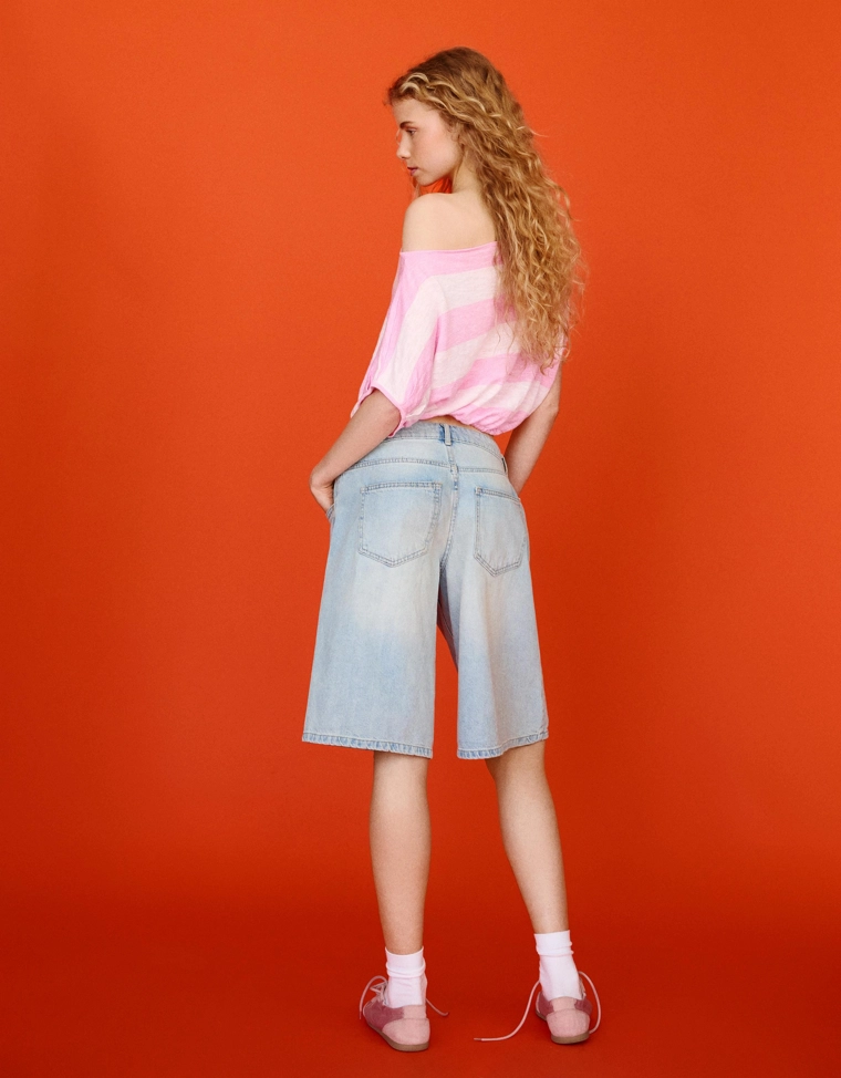 Асимметричный свитер в полоску