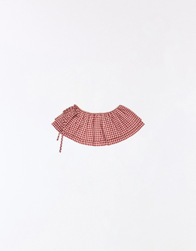 Юбка поверх брюк в клетку