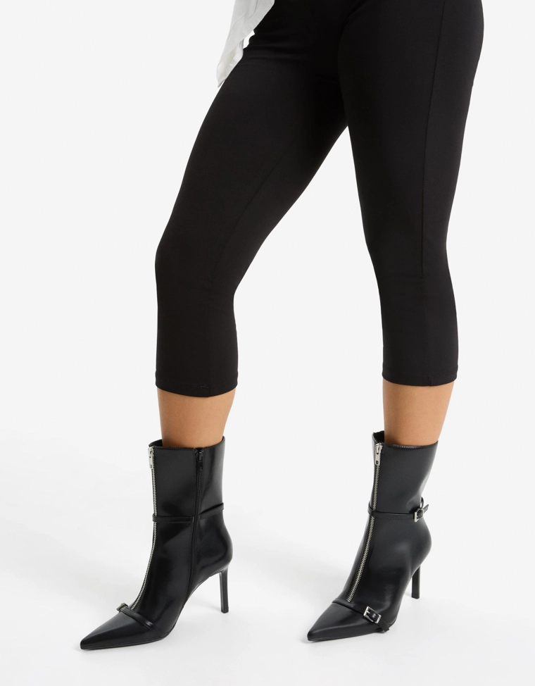 Heeled ankle boots with buckle detail