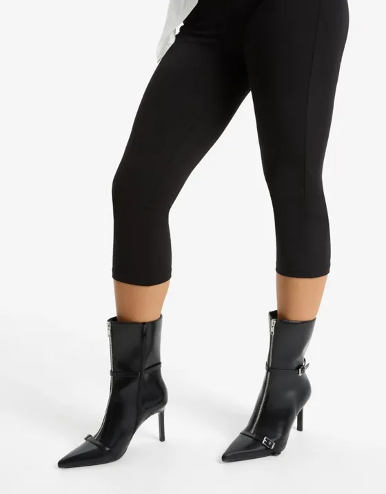 Heeled ankle boots with buckle detail
