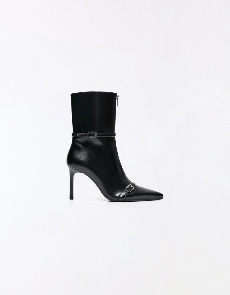Heeled ankle boots with buckle detail