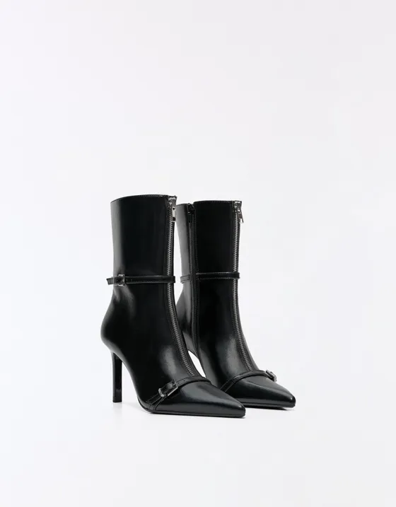 Heeled ankle boots with buckle detail