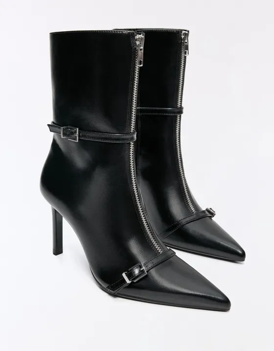 Heeled ankle boots with buckle detail
