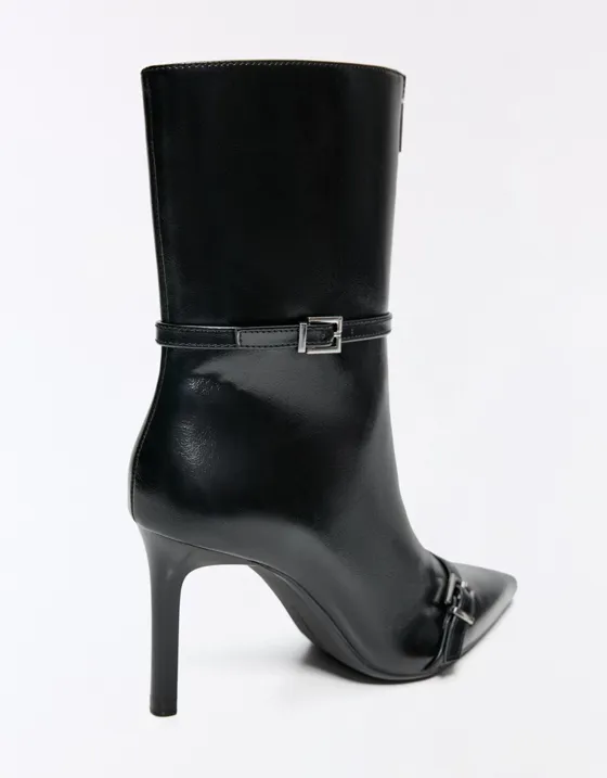 Heeled ankle boots with buckle detail
