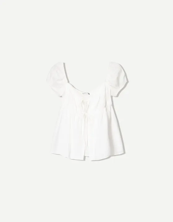 Топ из рельефной ткани с принтом и бантами