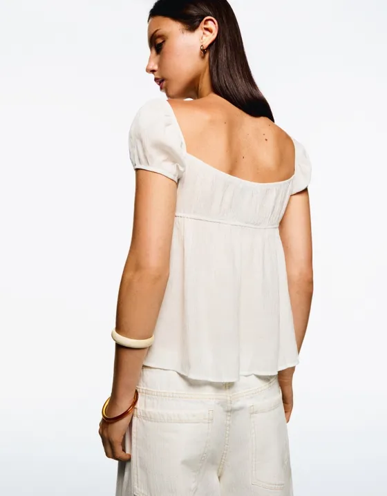 Топ из рельефной ткани с принтом и бантами