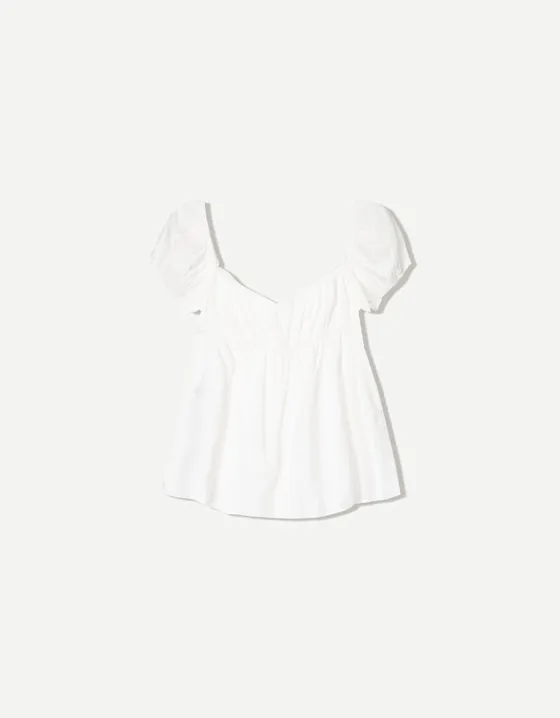 Топ из рельефной ткани с принтом и бантами