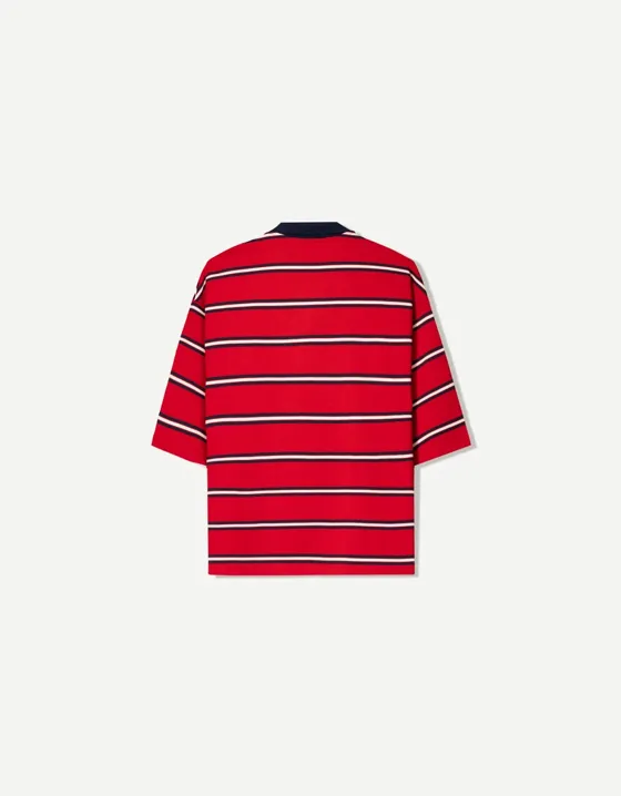 Short sleeve varsity polo shirt with patch