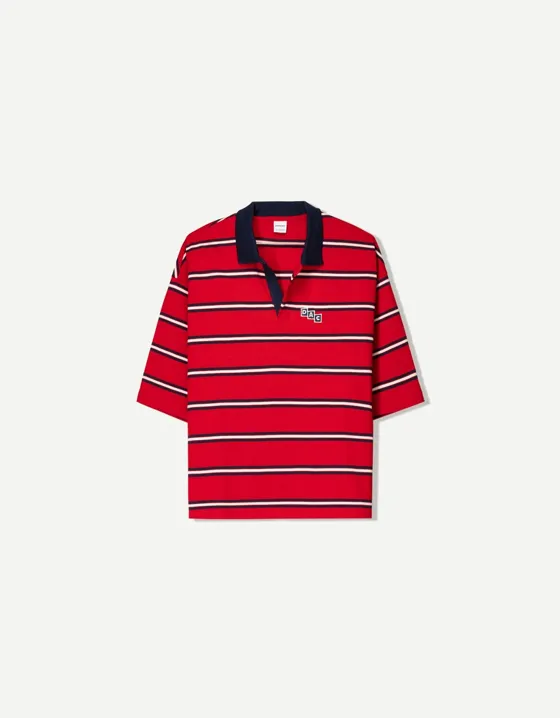 Short sleeve varsity polo shirt with patch
