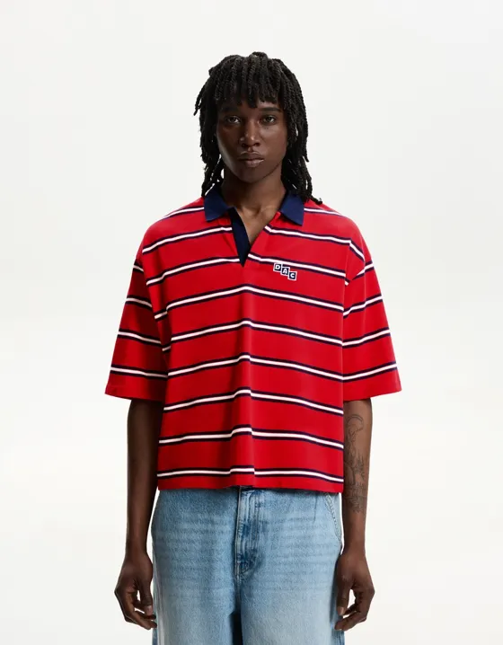 Short sleeve varsity polo shirt with patch