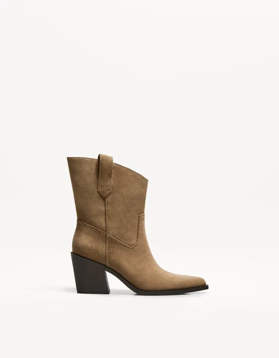 Asymmetric heeled cowboy ankle boots