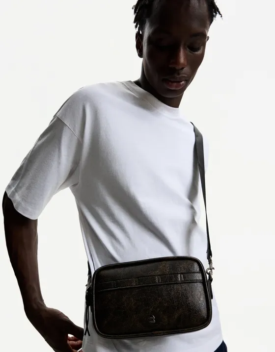 Distressed-effect crossbody bag