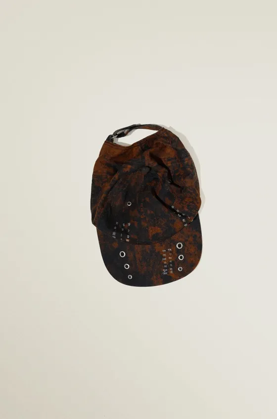 Cap with eyelets