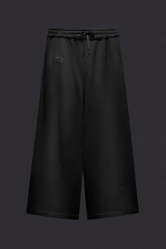 Брюки из мягкой ткани с логотипом out of core