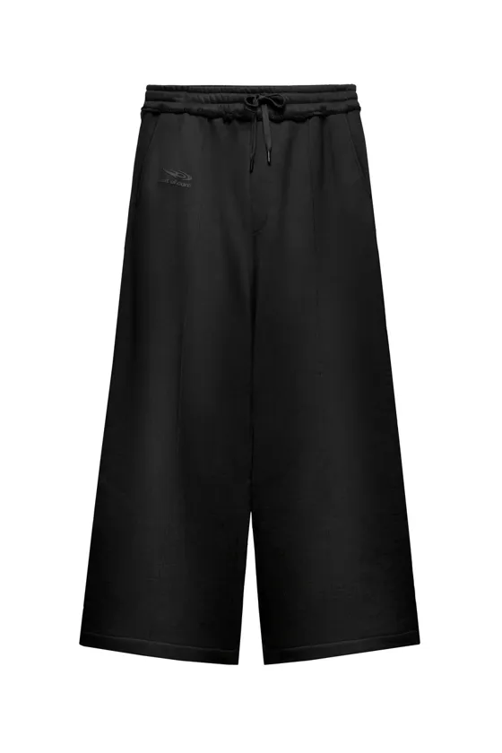 Брюки из мягкой ткани с логотипом out of core