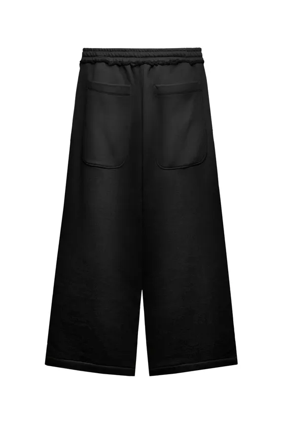 Брюки из мягкой ткани с логотипом out of core