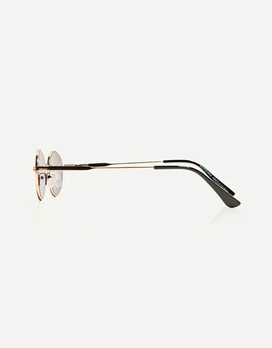 Солнечные очки овальной формы