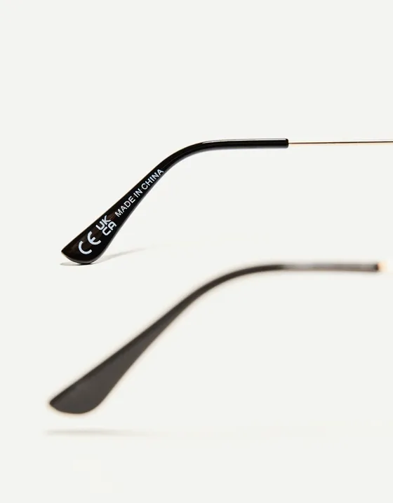 Солнечные очки овальной формы