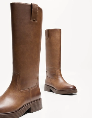 Сапоги до колена на низком каблуке- Заказать в России