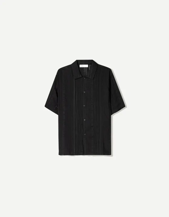 Рубашка из прозрачной ткани с короткими рукавами