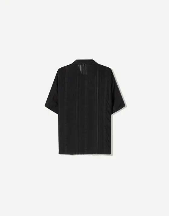 Рубашка из прозрачной ткани с короткими рукавами