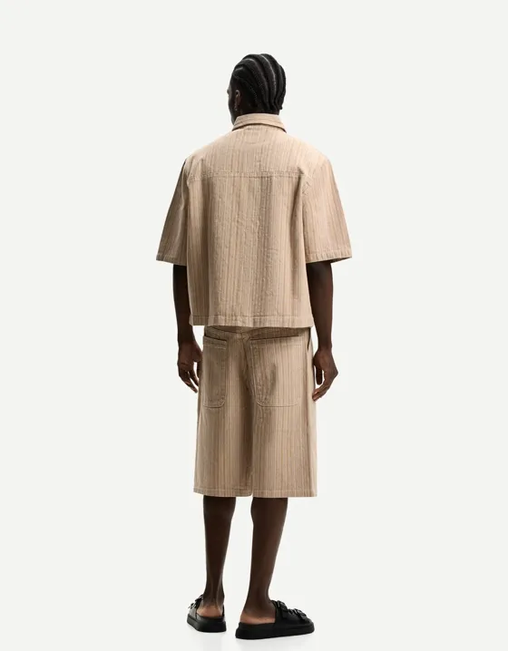 Джинсовые шорты в полоску