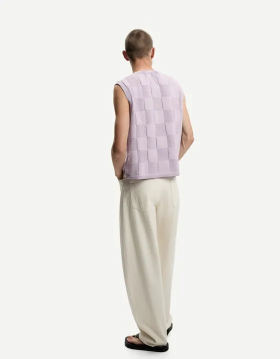 Жилет геометрического кроя в клетку