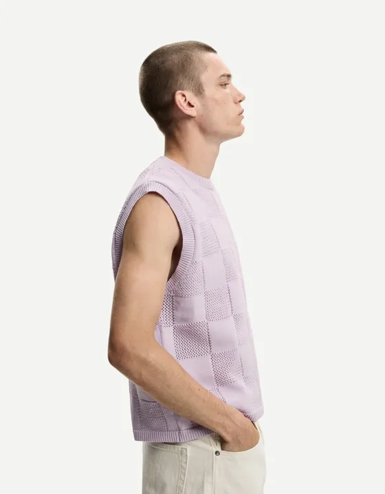 Жилет геометрического кроя в клетку