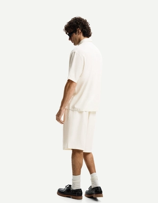 Шорты-джоггеры свободного кроя из смесового льна- Заказать в России