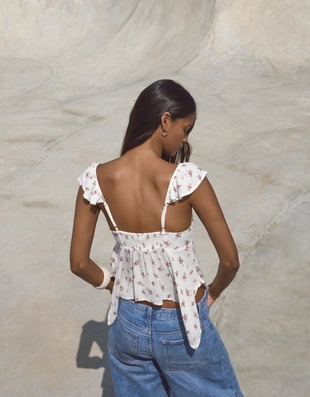 Блуза из рельефной ткани с принтом- Заказать в России