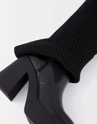 Сапоги с эластичным голенищем на высоком каблуке и платформе- Заказать в России